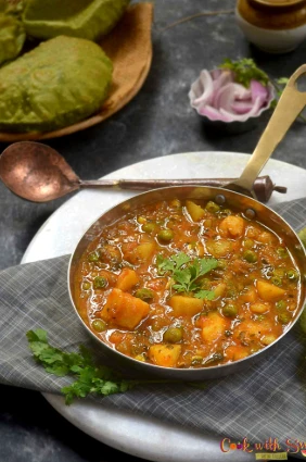 Aloo matar with pickle and roti ..
